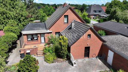 Ansicht von hinten - 6 Zimmer Einfamilienhaus zum Kaufen in Sande