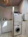 Waschmaschine und Trockner im Bad - 