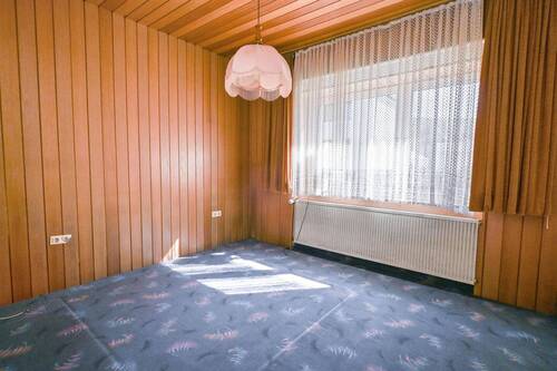 Schlafzimmer Erdgeschoss - Einfamilienhaus mit 133,60 m&sup2; in Oerlinghausen zum Kaufen