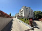 Die Wohnanlage am Bädleweg - Wunderschöne großzügige 3,5 Zi.-EG Wohnung mit 2 Terrassen, ca. 150 qm eigener Gartenanteil, Gäste-WC, TG-Platz und Abstellraum