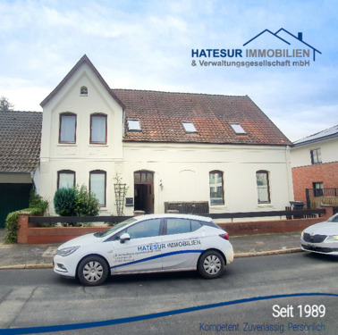 Titelbild - Attraktive Eigentumswohnung mit Terrasse und Gartenanteil in Nienburg zu verkaufen.