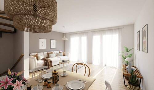 Lichtdurchfluteter Wohnbereich dank bodentiefer Fenster - 