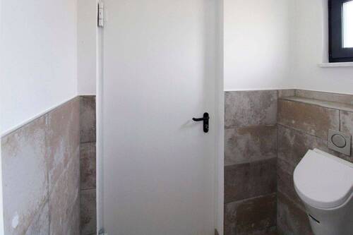 Gäste-WC Zugang zur Garage - 