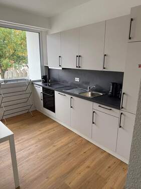 Küche mit Einbauküche - 