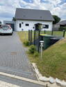 Auffahrt mit Mülltonnenplatz - 5 Zimmer Einfamilienhaus zum Kaufen in Belau