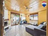 REMAX Immobilien DeLux Einfamilienhaus in Besseringen Wohnbereich - 