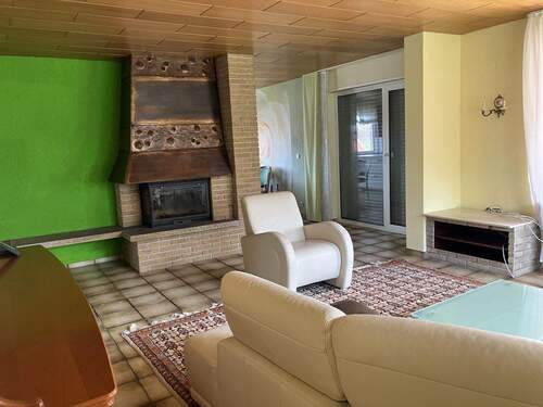 Wohnzimmer, Kamin, Zugang Terrasse - 