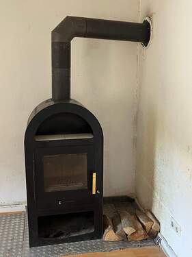 Holzofen im Wohnzimmer EG - 