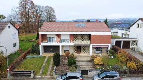 Titelbild - Charmantes Einfamilienhaus in ruhiger Lage mit Kamin, Loggia und gepflegtem Garten