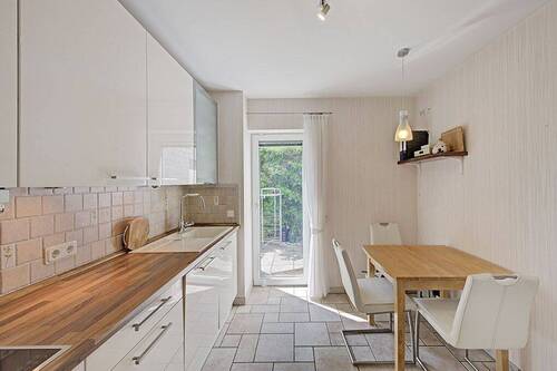 Küche mit Zugang zur seitlichen Terrasse - Mehrfamilienhaus, Wohnhaus mit 243,00 m² in Dortmund zum Kaufen