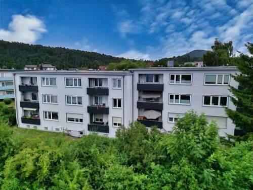 Rückansicht - Attraktives 12-Parteien-Mehrfamilienhaus - vollvermietet, modernisiert & nachhaltig beheizt!