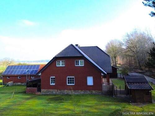 Bild 2 - 8 Zimmer Einfamilienhaus zum Kaufen in Neuenkirchen