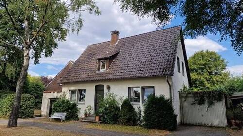 Straßenansicht Haus 1 - 7 Zimmer Einfamilienhaus zum Kaufen in Münster