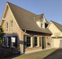 ***BÜSCHER IMMOBILIEN*** Charmantes Einfamilienhaus im Landhausstil mit großer Garage in begehrter Lage von Gronau-Epe