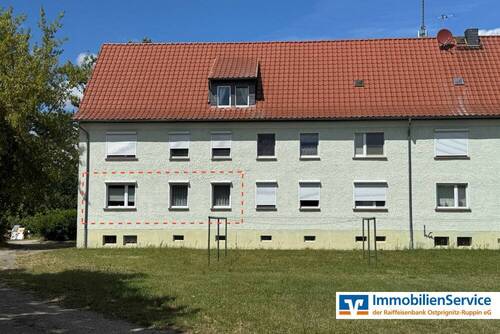 Hausansicht - Geflegte 4-Zi.-Erdgeschosswohnung mit Gartenblick, zwei Kellerräumen und Garagenoption!