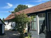 Eingang zum Haus und Anbau - Einfamilienhaus mit 204,00 m² in Dürrwangen zum Kaufen