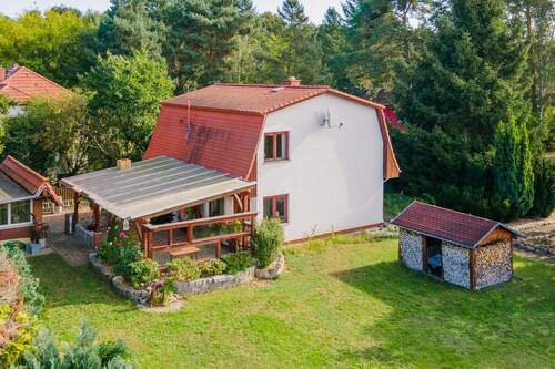 Gartenseite - Seenah! Mit Einbauküche, Fußbodenheizung, Carport, Nebengebäude usw.: Einfamilienhaus in Müggelheim