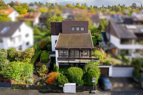Ansicht - Großzügiges Einfamilienhaus mit Einliegerwohnung und unverbaubarem Stadtblick