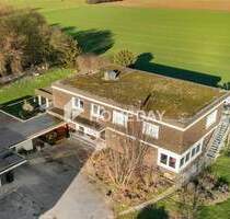 Großzügiges Einfamilienhaus mit Indoor-Pool, Einliegerwohnung und parkähnlichem Grundstück - Ennigerloh Ostenfelde