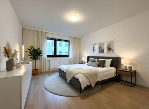 Schlafzimmer 1 (KI möbliert) - 