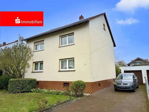 Vorderansicht - Freistehendes 2-Familienhaus mit Garage in gesuchter Wohnlage!
