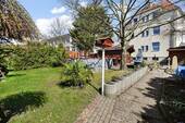 4-Familienhaus Gartenansicht - 