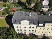 Luftbild - 1 Zimmer Mehrfamilienhaus, Wohnhaus zum Kaufen in Crimmitschau
