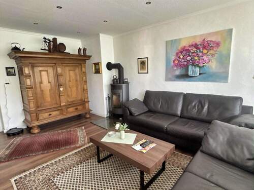 Wohnzimmer mit Kaminofern - 