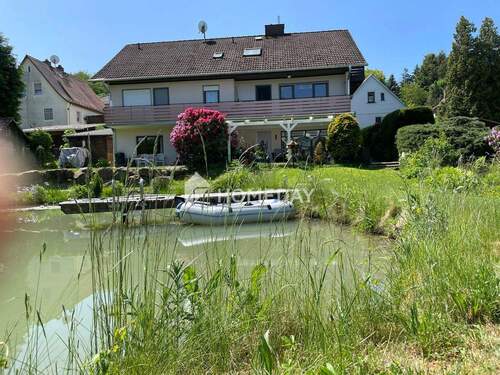Garten - Mehrfamilienhaus, Wohnhaus mit 270,00 m² in Hirzenhain zum Kaufen