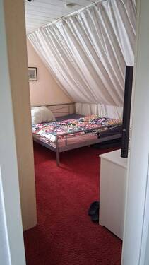 eines der Schlafzimmer im Dachgeschoss - 