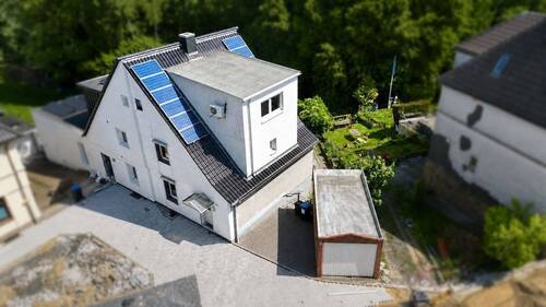 Außenansicht - Viel Platz für die Familie - modernisierte Doppelhaushälfte mit Garage und großem Garten