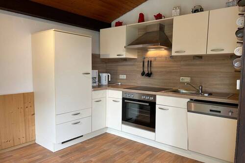 Küchenbereich mit EBK - Mehrfamilienhaus, Wohnhaus in Butjadingen zum Kaufen