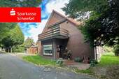 Straßenansicht - Zweifamilienhaus mit großem Grundstück in Fintel - Platz für Ideen und Familie