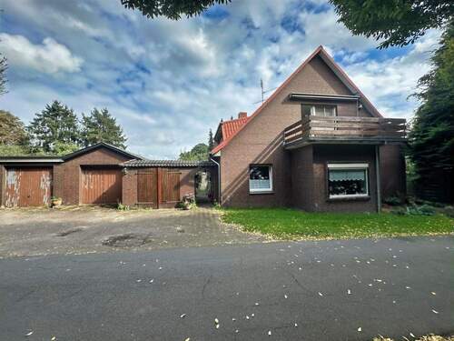 Straßenansicht - 7 Zimmer Mehrfamilienhaus, Wohnhaus zum Kaufen in Fintel