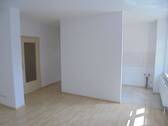 Wohnzimmer mit offener Küche - 