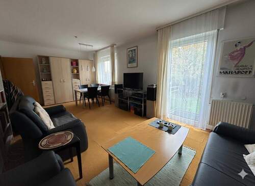 Wohnzimmer EG - Mehrfamilienhaus, Wohnhaus mit 210,00 m&sup2; in Bietigheim-Bissingen zum Kaufen