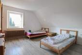 1.OG Schlafzimmer II - 