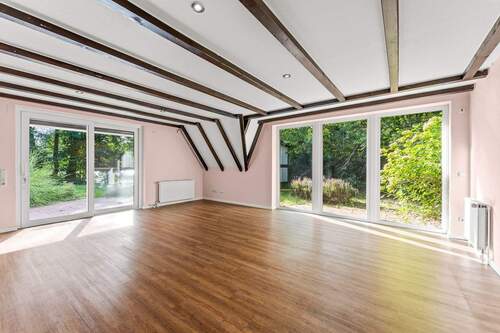 Wohnzimmer - Einfamilienhaus mit 156,00 m² in Ganderkesee zum Kaufen
