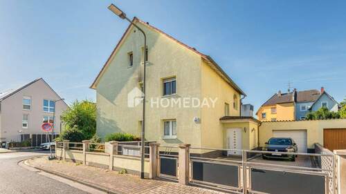 Außenansicht 1 - 9 Zimmer Mehrfamilienhaus, Wohnhaus zum Kaufen in Frankfurt