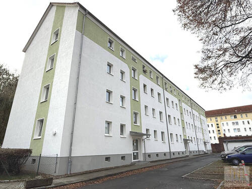 Außenansicht - Gepflegte 3-Raum-Wohnung mit Parkett, Garage und sofortiger Verfügbarkeit