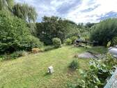 Blick von der Terrasse auf das gepflegte Grundstück - Grundstück in Dornburg-Camburg zum Kaufen