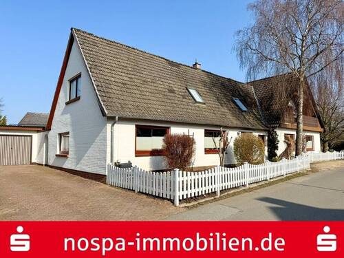 Straßenansicht - Teilweise vermietetes Wohnhaus mit 2 Wohneinheiten: Ideal für Eigentümer undoder Anleger