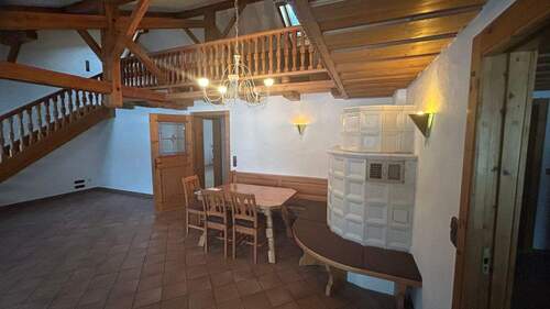 Wohnzimmer m Kachelofen - 