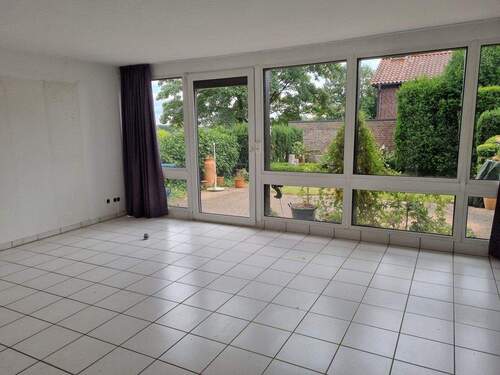 Fensterfront Wohnzimmer - Doppelhaushälfte mit 107,00 m² in Bad Iburg zum Kaufen