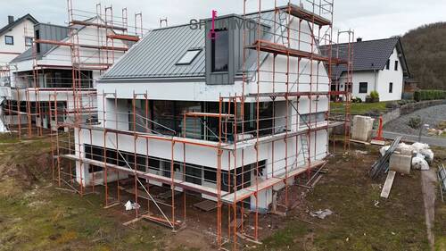 Bild 2 - 5 Zimmer Einfamilienhaus zum Kaufen in Utscheid