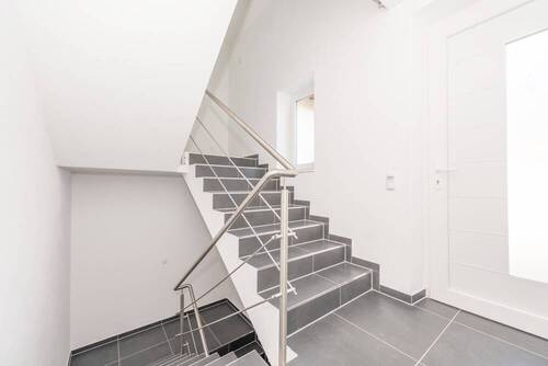 Treppenhaus - 4 Zimmer Etagenwohnung zum Kaufen in Büchlberg / Saderreut