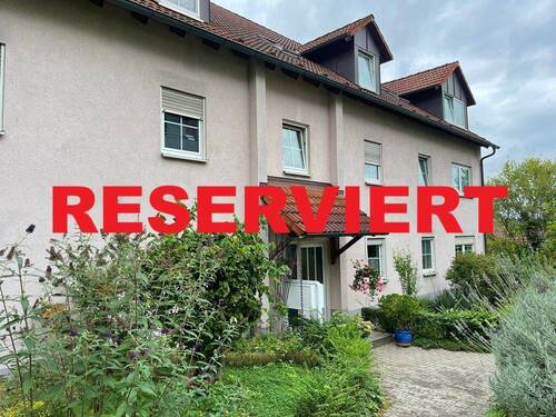 Außenansicht Eingangseite - Attraktive 3-Zimmer-Eigentumswohnung mit Terrasse, Garten und Garage
