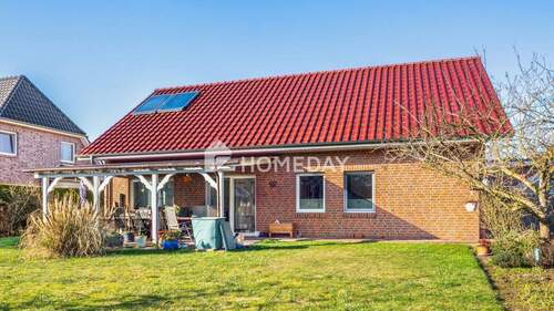 Außenansicht 2 - Stilvoller Bungalow in ruhiger Lage - Wohnen auf einer Ebene mit großzügigem Gartenparadies