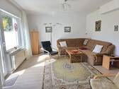 EG Wohnzimmer mit Kachelofen, Terrassen- und Gartenzugang (1)_#111242 - 