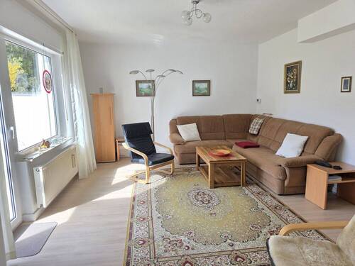 EG Wohnzimmer mit Kachelofen, Terrassen- und Gartenzugang (1)_#111242 - 